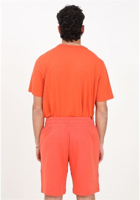 Shorts sportivo arancione da uomo Essentials+ Tape PUMA | Shorts | 84738794
