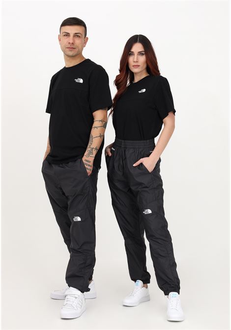 Pantalone sportivo nero per uomo e donna con stampa logo THE NORTH FACE | Pantaloni | NF0A5J5PJK31JK31