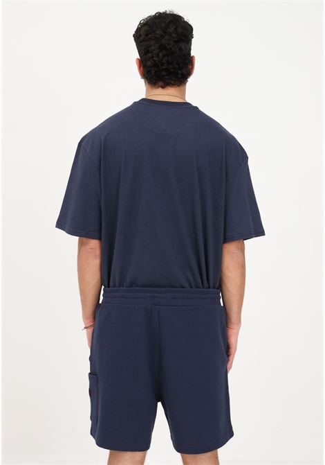 Shorts casual blu da uomo con tasca cargo e patch logo TOMMY HILFIGER | Shorts | DM0DM16330C87C87