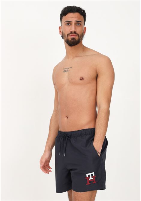 Shorts mare blu da uomo con logo TH TOMMY HILFIGER | Beachwear | UM0UM02732DW5