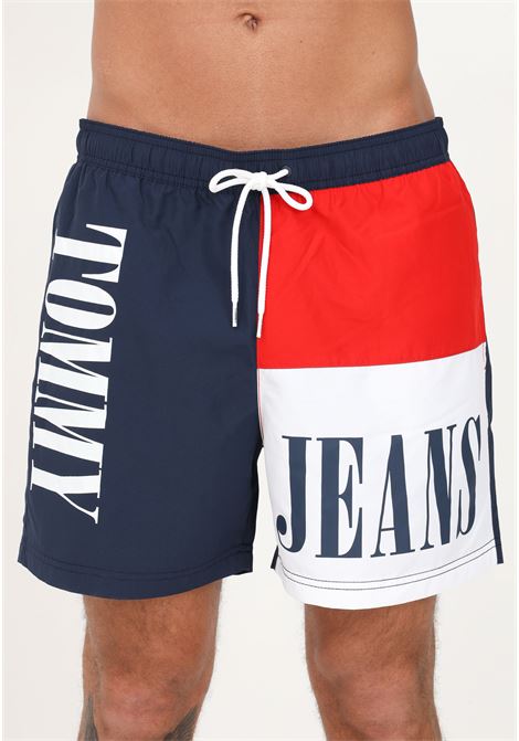 Shorts mare blu da uomo con motivo color block e logo TOMMY HILFIGER | Beachwear | UM0UM02753C87