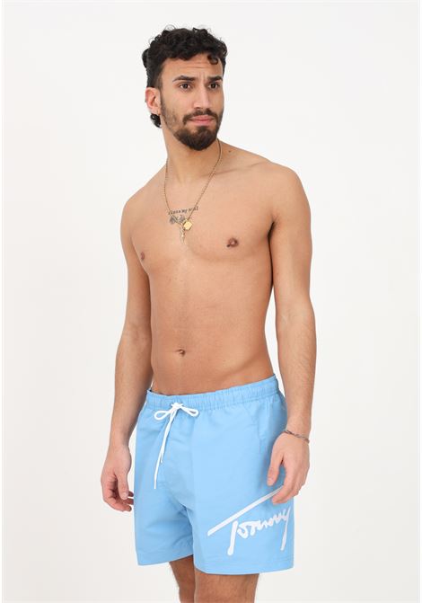 Shorts mare azzurro da uomo con stampa logo TOMMY HILFIGER | Beachwear | UM0UM02862CY7