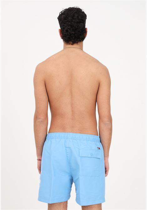 Shorts mare azzurro da uomo con stampa logo TOMMY HILFIGER | Beachwear | UM0UM02862CY7
