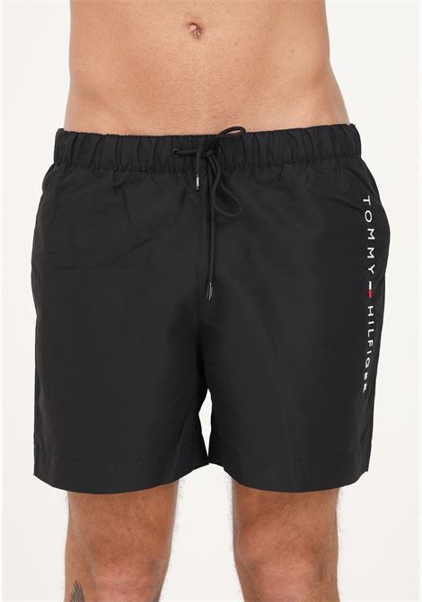 Shorts mare nero da uomo con ricamo logo laterale TOMMY HILFIGER | Beachwear | UM0UM02885BDS