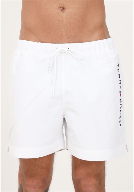 Shorts mare bianco da uomo con ricamo logo laterale TOMMY HILFIGER | Beachwear | UM0UM02885YBR