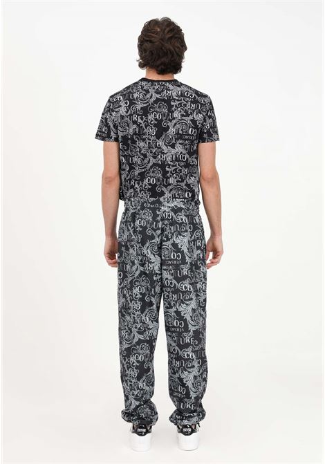 Pantalone casual nero da uomo con fantasia Logo Couture VERSACE JEANS COUTURE | Pantaloni | 74GAAD04CQS51801