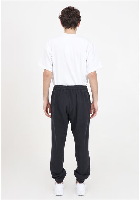 Pantaloni da uomo neri Adicolor french terry sweat ADIDAS ORIGINALS | Pantaloni | HK2866.
