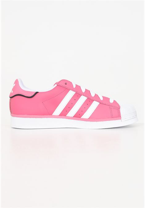 Pink women's sneakers with 3 white SUPERSTAR stripes ADIDAS ORIGINALS | Sneakers | IE0863.
