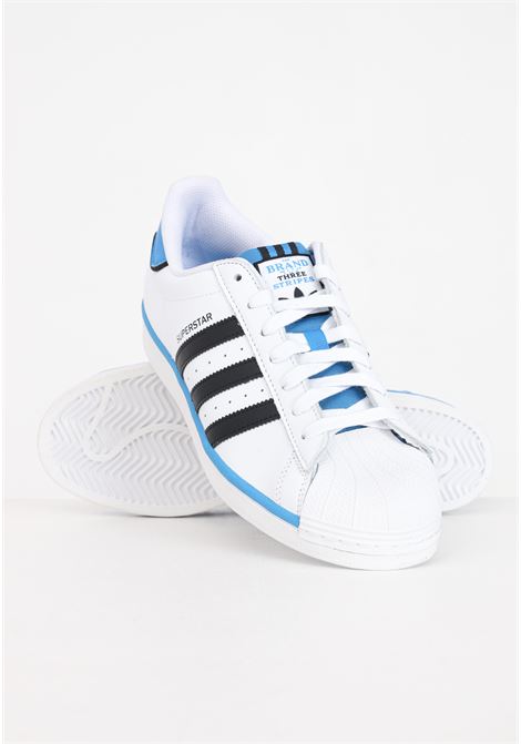 White, black and bright blue adidas superstar men's sneakers ADIDAS ORIGINALS | Sneakers | IF3640.