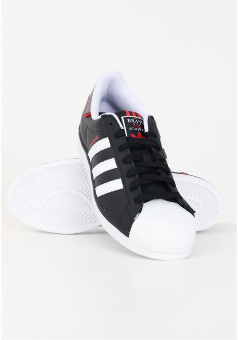 Black, white and red Superstar men's sneakers ADIDAS ORIGINALS | Sneakers | IF3641.