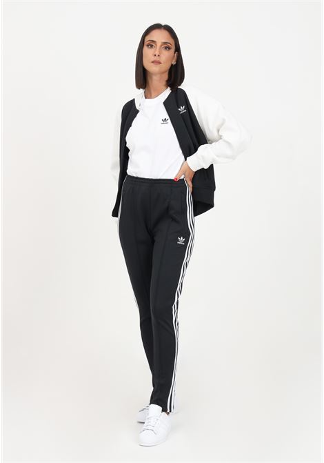 Black women's trousers with zip pockets ADIDAS ORIGINALS | IK6600.