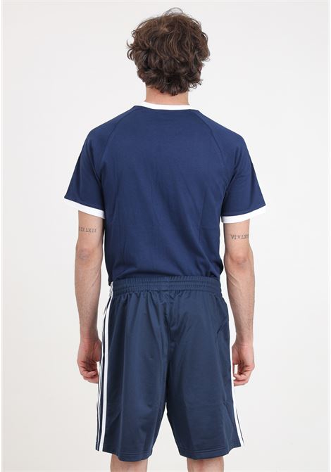 Shorts da uomo blu notte e bianchi Adicolor firebird ADIDAS ORIGINALS | Shorts | IM9422.