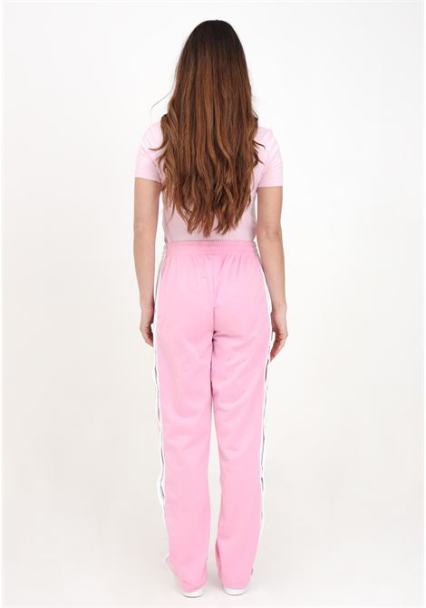 Pantaloni da donna rosa e bianchi adibreak ADIDAS ORIGINALS | Pantaloni | IP0618.