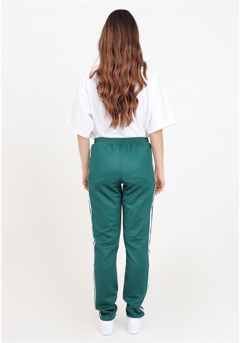 Pantaloni da donna verde a strisce laterali montreal ADIDAS ORIGINALS | Pantaloni | IP0628.