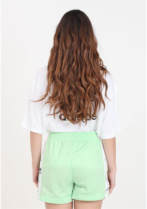 Shorts da donna verdi e bianchi con chiusura laterale con bottoni a clip ADIDAS ORIGINALS | IP0719.