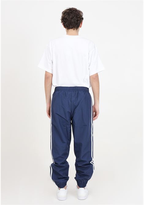 Pantaloni blu da uomo Woven Fbird TP ADIDAS ORIGINALS | Pantaloni | IT2500.