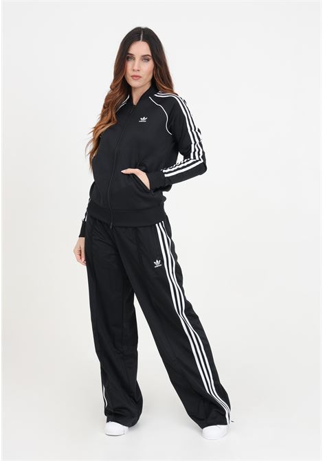 Pantaloni da donna neri joggers Firebird Loose con righe verticali ADIDAS ORIGINALS | IT7404.