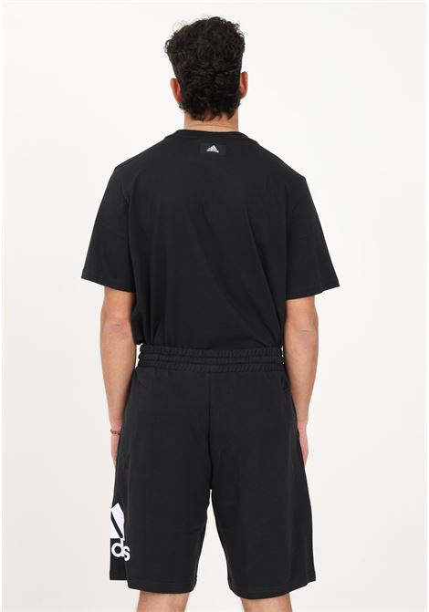 Shorts da uomo nero sportivo Essentials con stampa logo grande ADIDAS PERFORMANCE | Shorts | IC9401.