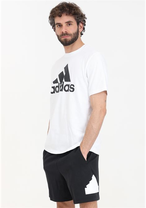 Black men's shorts with white Future Icons logo patch ADIDAS PERFORMANCE | Shorts | IN3320.