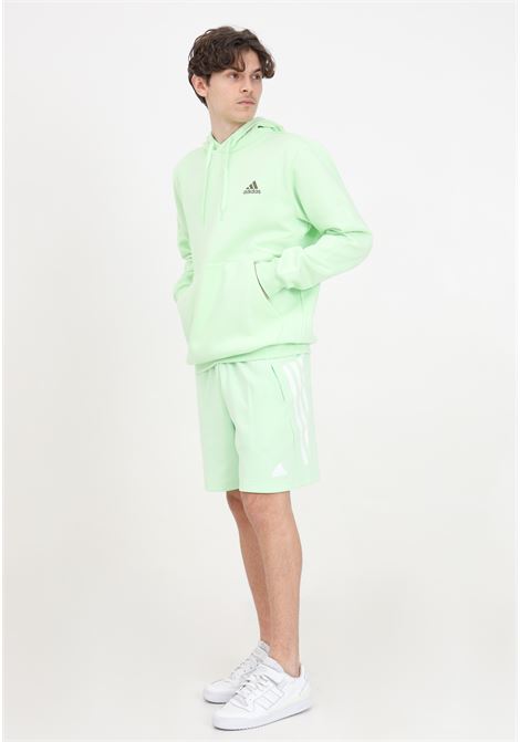 Shorts da uomo verdi e bianchi con patch logo ADIDAS PERFORMANCE | Shorts | IR9200.