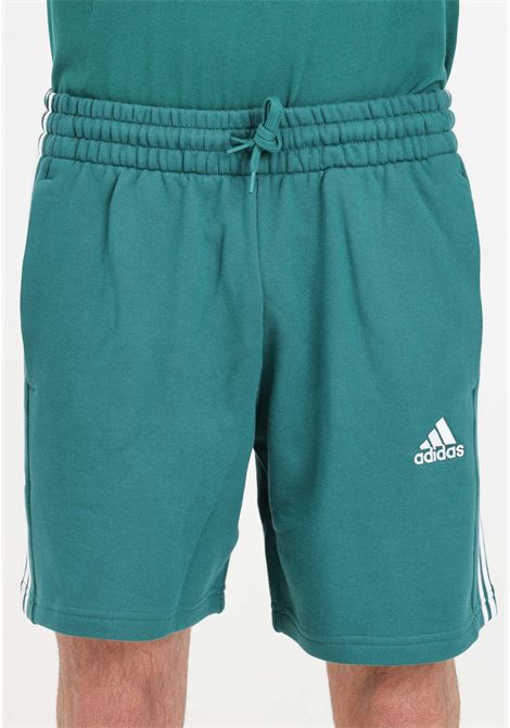 Shorts da uomo verdi e bianchi Essentials french terry 3 stripes ADIDAS PERFORMANCE | IS1342.