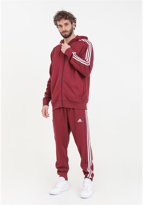 Essentials men's french terry tapered cuff 3-stripes red and white trousers ADIDAS PERFORMANCE | IS1366.