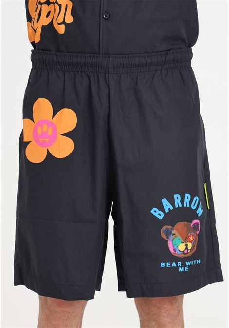 Black men's and women's shorts with allover color prints. BARROW | S4BWUABE060110