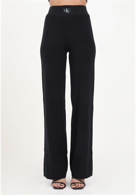 Women's black flared trousers in ribbed stretch cotton CALVIN KLEIN JEANS | Pants | J20J222599BEHBEH