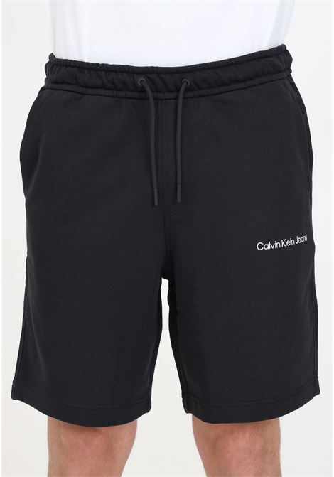 Shorts da uomo neri con stampa lettering logo in contrasto CALVIN KLEIN JEANS | Shorts | J30J325133BEHBEH