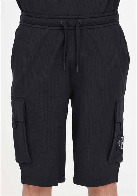 Black Bermuda shorts for men by Calvin Klein Jeans CALVIN KLEIN JEANS | J30J325136BEHBEH