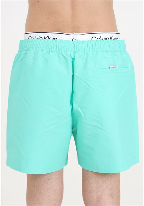 Aqua green men's swim shorts with logo print and logoed elastic waistband CALVIN KLEIN | KM0KM00957LB9
