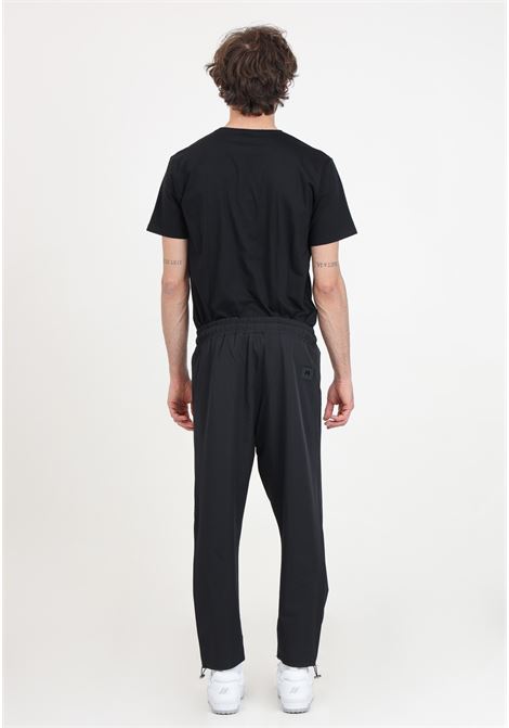 Black men's trousers with logo patch on the back DIEGO RODRIGUEZ | DR308NERO