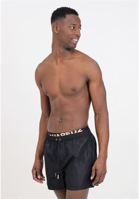 Shorts mare da uomo neri con fascia logata elastica in vita DSQUARED2 | Beachwear | D7B645490001