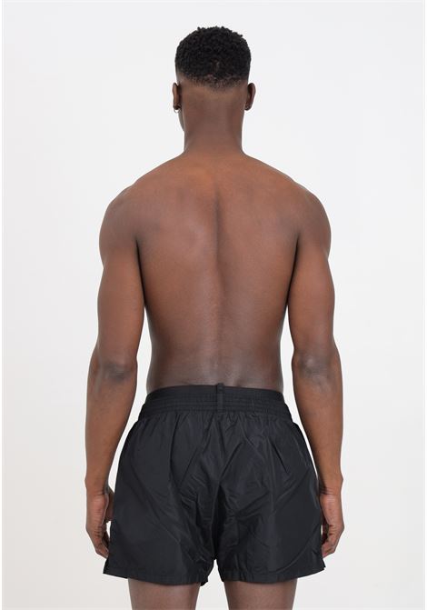 Shorts mare da uomo neri con fascia logata elastica in vita DSQUARED2 | Beachwear | D7B645490001