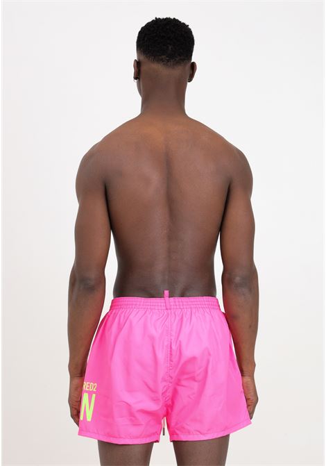 Shorts mare rosa fluo da uomo con stampa logo verde fluo DSQUARED2 | Beachwear | D7B8P5380667