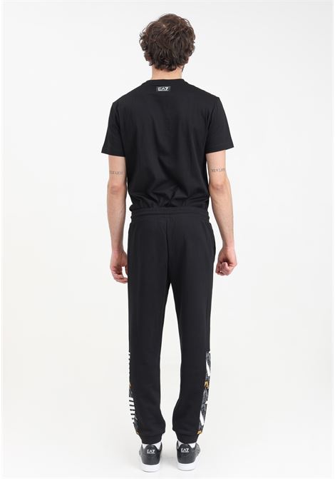 Men's black Graphic Series jogger trousers in cotton EA7 | 3DPP88PJEQZ1200