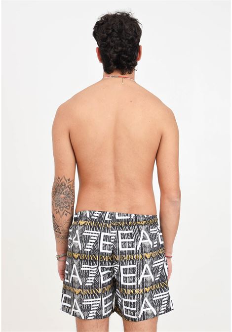 Shorts mare da uomo nero con logo all-over AVS EA7 | Beachwear | 9020004R74837321