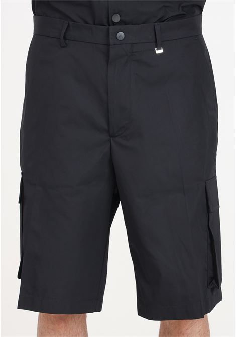 Black men's shorts with large cargo pockets and side logo patch I'M BRIAN | Shorts | BE2860009