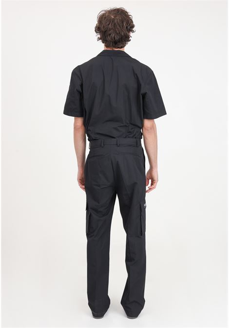 Black men's trousers with large cargo pockets and side logo patch I'M BRIAN | PA2861009