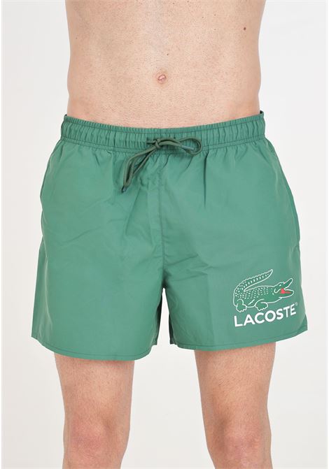 Shorts mare verde con stampa logo sul davanti e patch logo LACOSTE | MH6912132