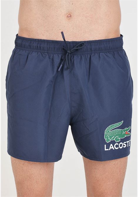 Shorts mare blu notte con stampa logo sul davanti e patch logo LACOSTE | Beachwear | MH6912166
