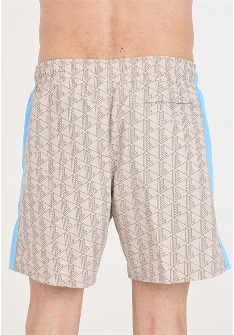 Brown men's swim shorts with allover monogram print LACOSTE | Beachwear | MH6980IRF
