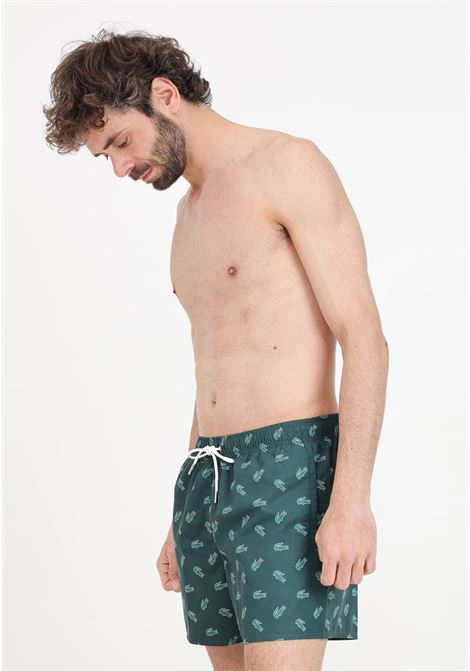 Green men's swim shorts with allover crocodile pattern LACOSTE | Beachwear | MH7188DCJ