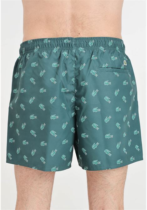 Green men's swim shorts with allover crocodile pattern LACOSTE | MH7188DCJ