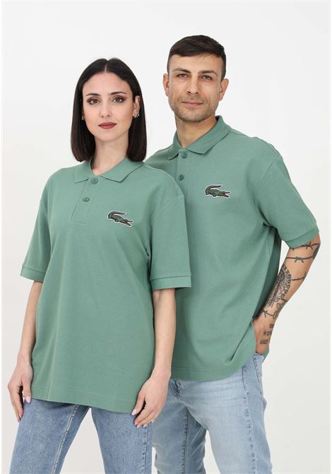 Polo verde per uomo e donna con coccodrillo ricamato sul petto LACOSTE | Polo | PH3922KX5