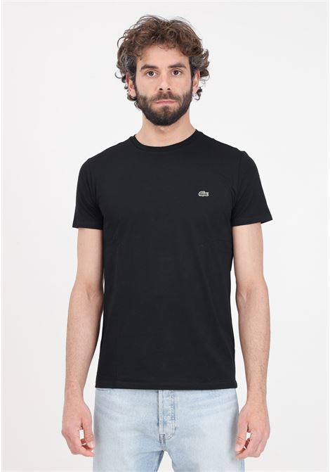 T-shirt nera donna uomo con patch logo LACOSTE | TH6709031