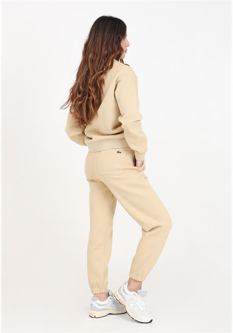 Beige women's trousers with crocodile patch on the back LACOSTE | Pants | XF7077IXQ