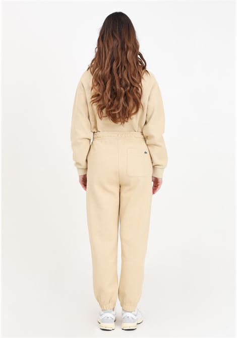 Beige women's trousers with crocodile patch on the back LACOSTE | Pants | XF7077IXQ