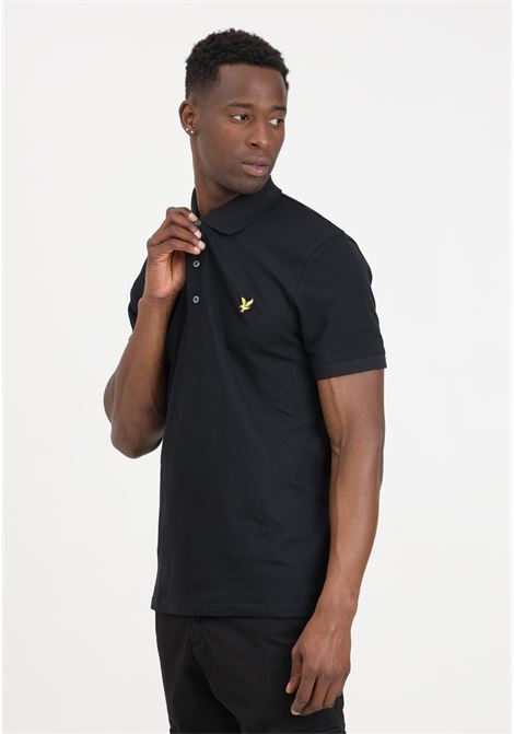Black men's polo shirt with golden eagle logo patch LYLE & SCOTT | SP400VOGEZ865