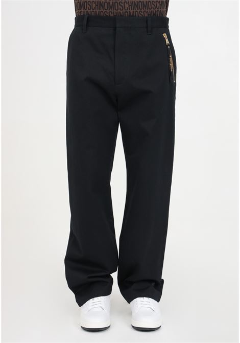 Pantaloni neri da uomo con dettagli oro MOSCHINO | Pantaloni | A031302130555